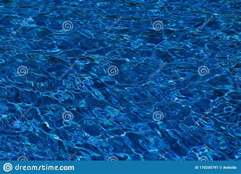 Abstract Background Of Blue Water Surface In Swimming Pool Stock Image