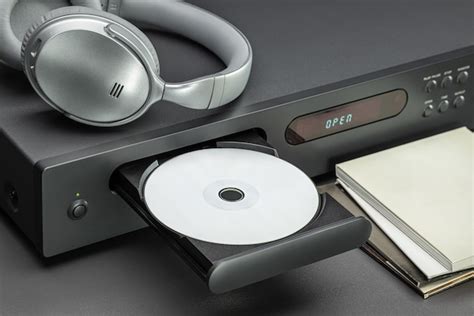 Premium Photo Cd Player And Headphones For Listening To Music Open