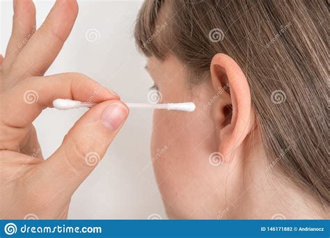 Woman Cleans Her Ears With Cotton Swab Stock Photo Image Of Lifestyle
