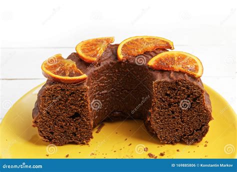 Closeup Half A Homemade Chocolate Cake Decorated With Candied Orange