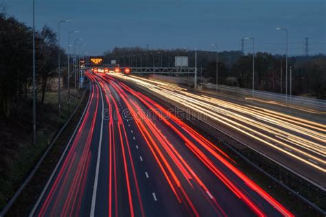 Light Trails From Fast Moving Traffic On M42 Motorway At Night Stock