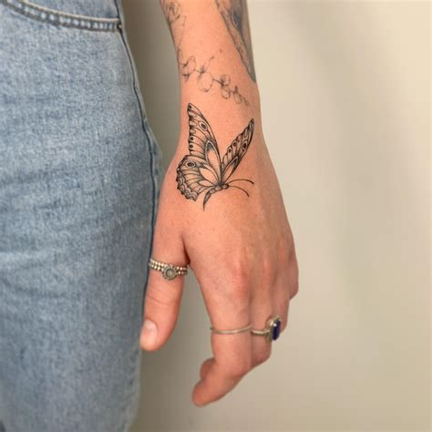 30 Awesome Butterfly Hand Tattoo Ideas For Men And Women In 2023