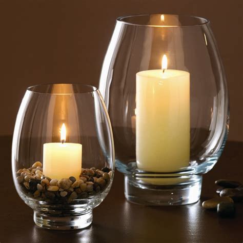 These glass candle holders will delight every passionate beachcomber. Elegant tall candle holders | Home Lighting Design Ideas