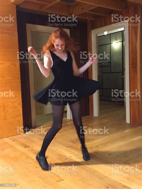 Image Of Young Teenage Redhead Girl Spinning Around In Little Black