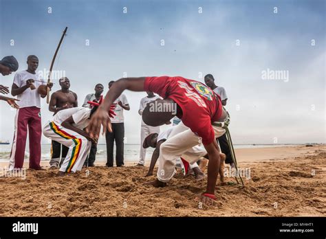 namibe angola 28 aug 2013 african sportsmen practicing the famous brazilian capoeira fight