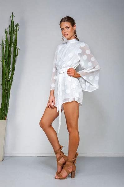 At the beginning of the year, we were all planning our wedding guest outfits for various upcoming nuptials. The Enchanted Playsuit // Semi sheer summer outfit via ...
