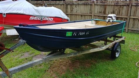 12 Ft Jon Boat With A 99 Johnson Outboard And Trailer Pensacola