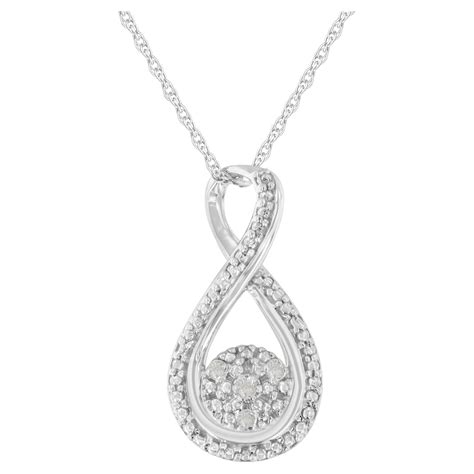 Sterling Silver Pear Sapphire And Diamond Accent Infinity Drop Pendant