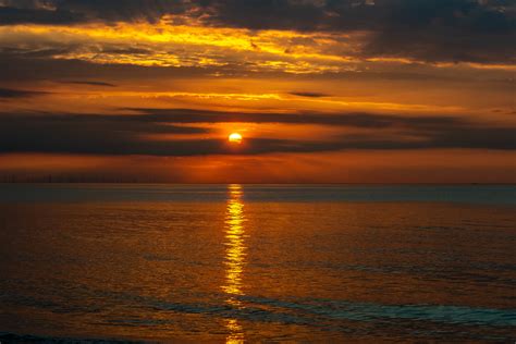 Download Wallpaper 6000x4000 Sea Water Horizon Sun Clouds Sunset