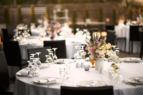 Formal Dinner Service At A Outdoor Wedding Banquet Stock Photo