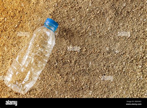 Plastic Water Bottles Pollution In Beach Environment Concept Stock