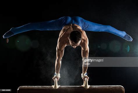 Male Gymnast Doing Handstand On Pommel Horse High Res Stock Photo