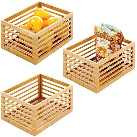 Three Wooden Crates Filled With Fruit On Top Of Each Other