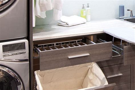 Modern Laundry Room Features Brown Melamine Cabinets Fitted With A Pull
