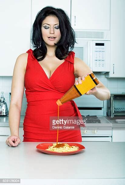 Pouring Spaghetti Sauce Photos And Premium High Res Pictures Getty Images