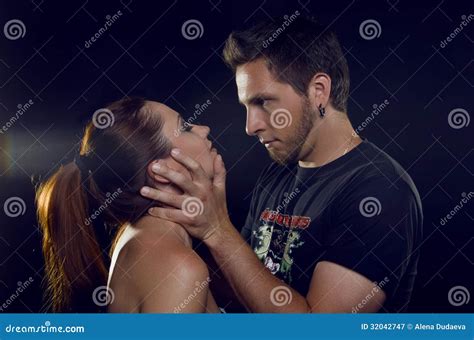 A Pair Of Lovers The Guy Grabbed The Girl S Face With His Hands Stock Image Image Of Handsome