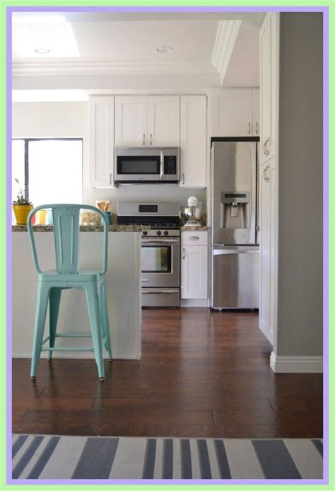 #jennyforyourthoughts #cleanyourwaytocalmjoin me as i transform my outdated maple cabinets into light and airy white cabinets with the rustoleum cabinet. light grey kitchen walls with white cabinets-#light #grey ...