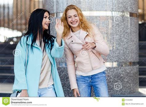 Two Girls Standing By Wall Stock Image Image Of Model