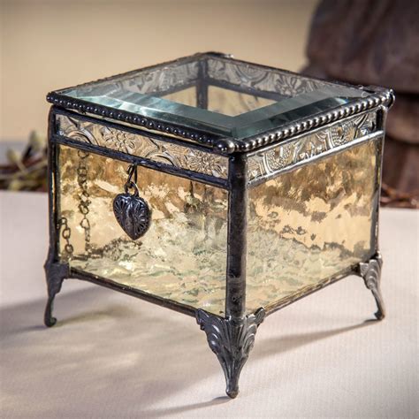 The Unexpected Blend Of Glass Pieces Gives This Glass Jewelry Box Timeless Appeal Making It The