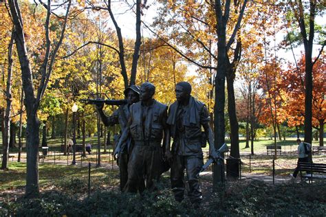 Paying Homage At The Vietnam Veterans Memorial In Washington Dc