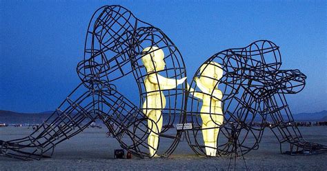 On Burning Man By Alexander Milov Two Adults Back To Back Street Art Utopia