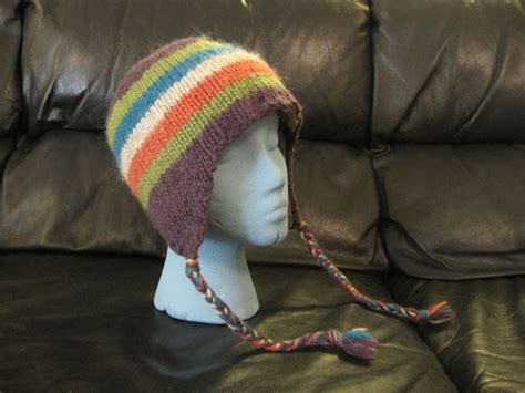 How to knit a baby hat with ear flaps (beginner level). Classic Ear Flap Hat | AllFreeKnitting.com