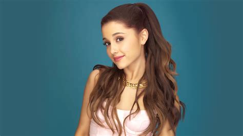 Brown Hair Ariana Grande With Pink Dress In Blue Background 4k Hd