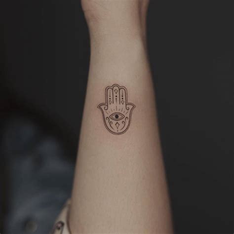 Fine Line Hamsa Tattoo On The Wrist