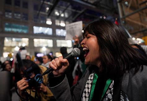 protesters stage sit in inside new york times building calling for gaza ceasefire