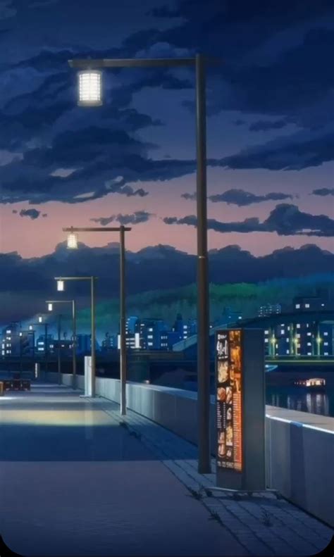The City Lights Shine Brightly At Night In This Animated Scene From An