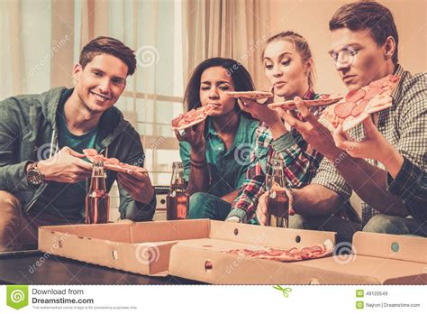 Multi Ethnic Friends With Pizza And Bottles Of Drinks Stock Image Image Of Casual Birthday