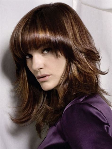 The soft hair lines go naturally down the round face and make a beautiful face silhouette effortlessly. Easy to Style Medium Haircuts 2012|