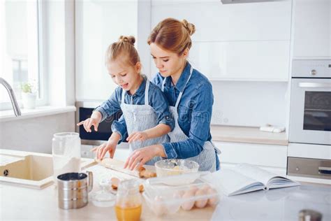 Mother With Daughter In The Kitchen Stock Image Image Of Daughter Girl 181290611
