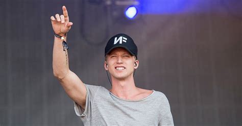 On The Charts Rapper Nf Grabs First Number One With Perception Nf