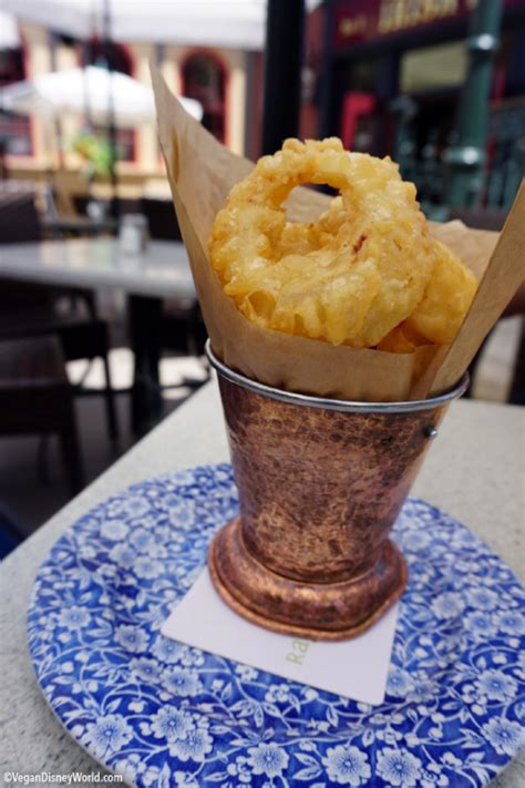 Using a fork, dip raw onion ring into batter until entire onion is covered. Raglan Road's Vegan Onion Rings - Vegan Disney World
