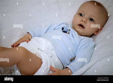 Young Baby In Terry Nappy Stock Photo Alamy