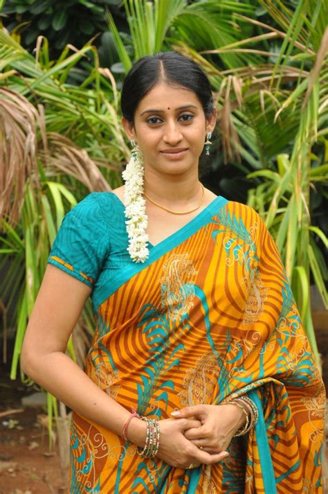 Telugu Tv Serial Actress Meena In Yellow Saree Picture Gallery Photos