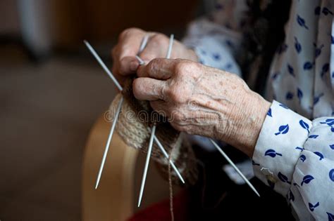 Close Up Of The Hands Of An Old Woman Knitting Sock Stock Image Image