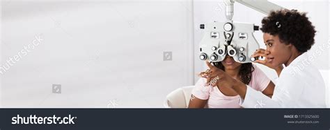 Optician Doing Optometry Eye Exam Black Stock Photo 1713325600