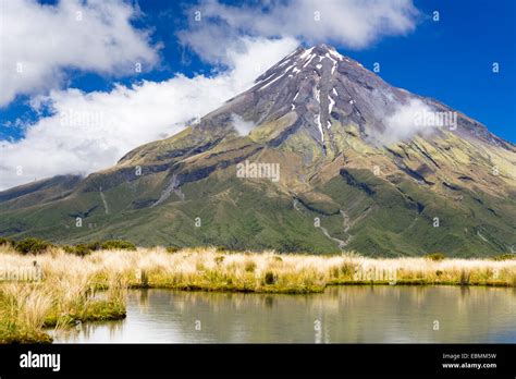 Mountain Lake With The Mount Taranaki Volcano Pouakai Range Egmont