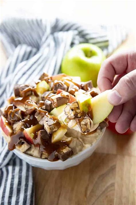 It's so simple and so delicious! Snickers Caramel Apple Dip - The Salty Marshmallow