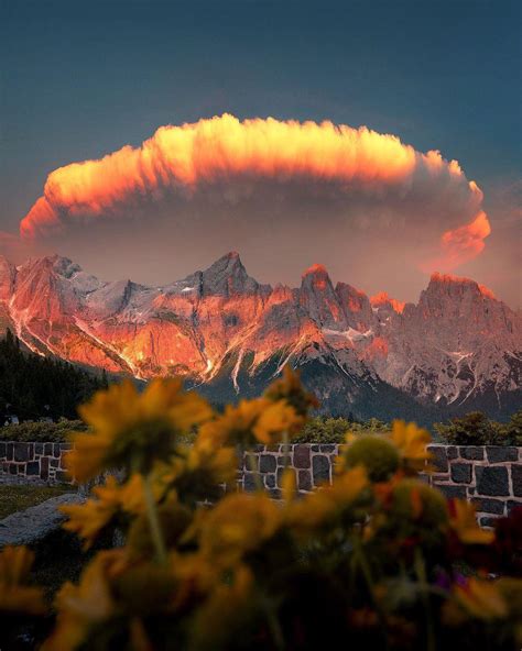 this cloud formation over the dolomites italy looks like a ufo r interestingasfuck