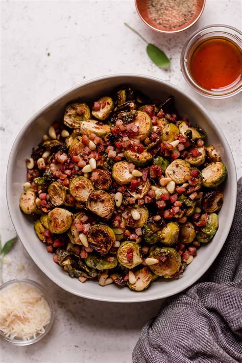 In a large mixing bowl, toss together the brussels sprouts, pancetta, olive oil, garlic, and some salt and pepper. Maple Mustard Roasted Brussels Sprouts with Pancetta, Pine ...