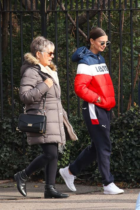 Emily Ratajkowski Seen In A Blue White And Red Levis Puffer Jacket