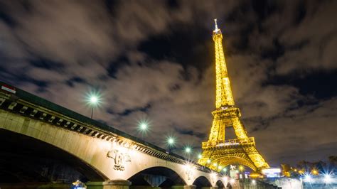 Bridge Side View Of Yellow Lighting Paris Eiffel Tower With Background