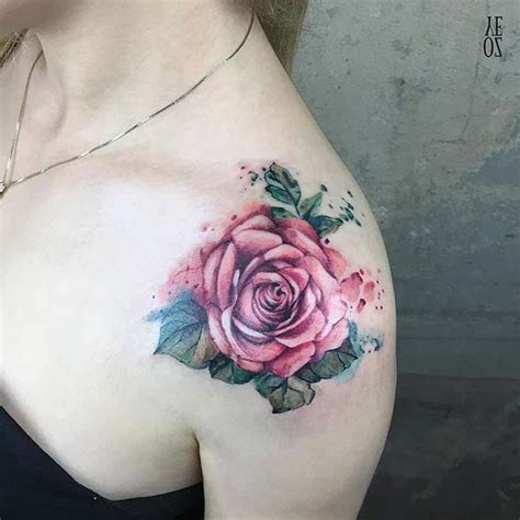 The watercolor blends beautifully with the rose and looks very fitting for a natural flower tattoo. 21 Rose Shoulder Tattoo Ideas for Women | StayGlam