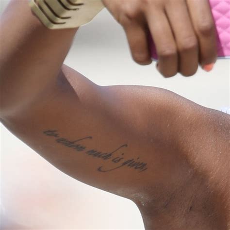 Eva Marcille Writing Bicep Tattoo Steal Her Style