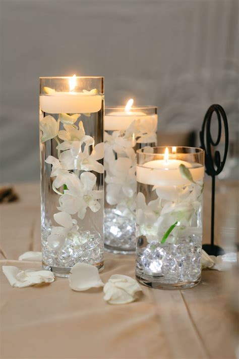 Floating Candle Wedding Centerpiece | Floating candles wedding, Candle