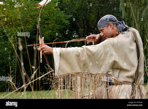 Native American Indian Man With A Bow And Arrow Hunting Stock Photo Alamy