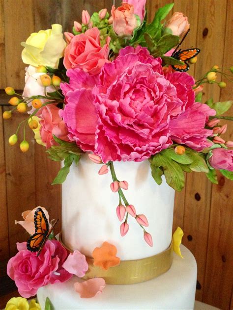 A Whimsical Sugar Flower And Sugar Butterfly Wedding Cake